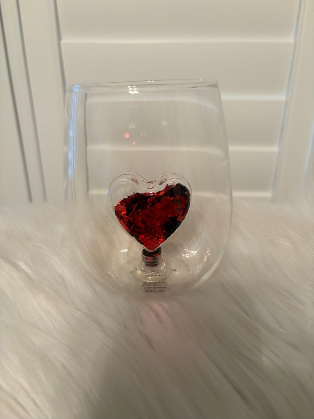 Anthropologie clear glass with sequins heart in the center